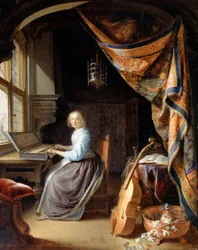 A Woman playing a Clavichord